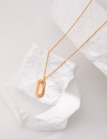Sterling Silver Pearl Necklace with Twisted Möbius Oval Design