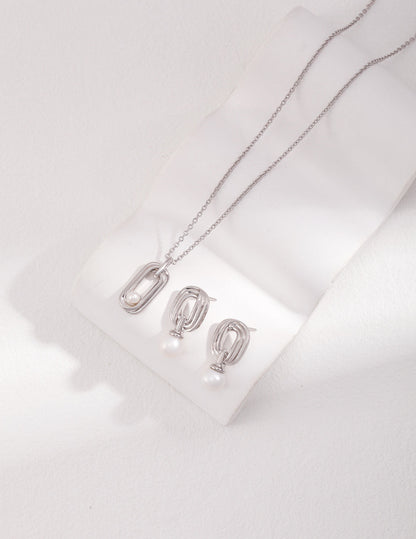 Sterling Silver Pearl Necklace with Twisted Möbius Oval Design