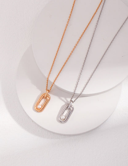 Sterling Silver Pearl Necklace with Twisted Möbius Oval Design