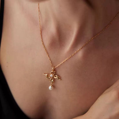 Elegant Butterfly Cross Pearl Necklace