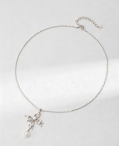 Elegant Butterfly Cross Pearl Necklace