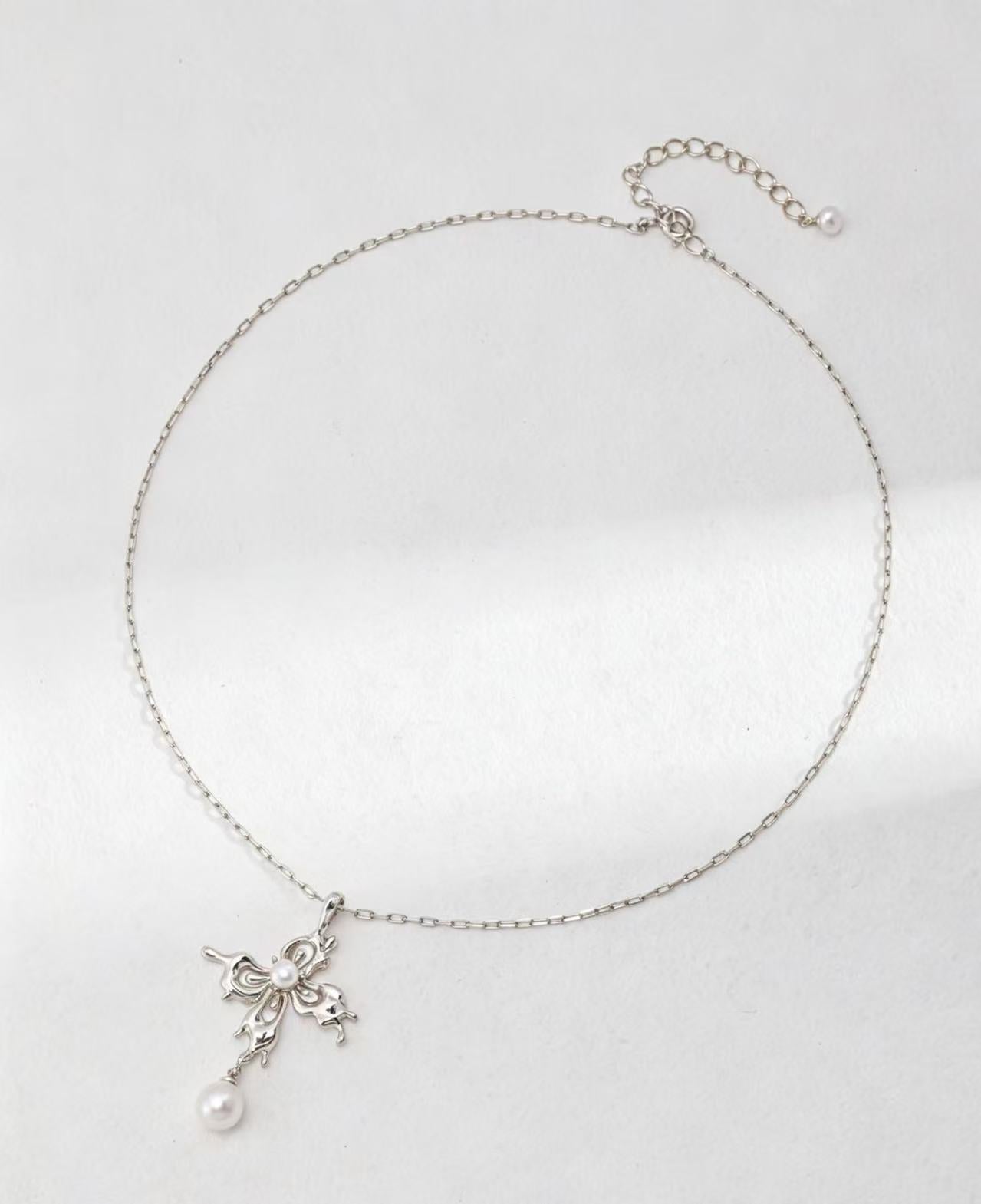 Elegant Butterfly Cross Pearl Necklace