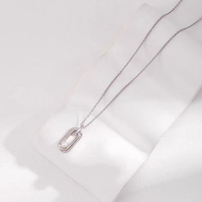 Sterling Silver Pearl Necklace with Twisted Möbius Oval Design
