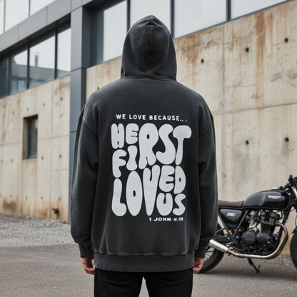 Washed Black "He First Loved Us" Hoodie - 1 John 4:19 Faith Pullover, Organic Cotton